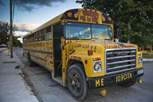Cuba, Varadero, American yellow school bus, given to aid USA - Cuban relations