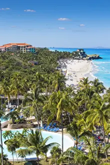 Cuba, Varadero, View over Melia Varadero Hotel swimming pool towards Xanadu mansion