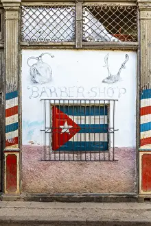 Street Art Prints: Cuban flag painted on the window of a barber shop in La Habana Vieja (Old Town), Havana