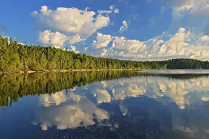 Ear Falls Prints: Cumulus clouds reflected in Lac Seul Ear Falls Ontario, Canada