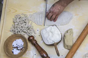 Ingredient Prints: Cutting of the dough for the production of Pizzoccheri. Lombardy. Italy. Europe
