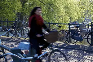Images Dated 21st December 2011: Cyclist, Amsterdam, Netherlands