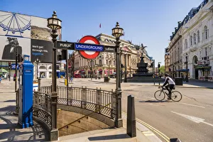 Afternoon Prints: Cyclist going through Piccadilly Circus, London, England, UK