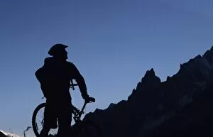 Action Sport Gallery: A cyclist on a mountain bike tour of Mont Blanc