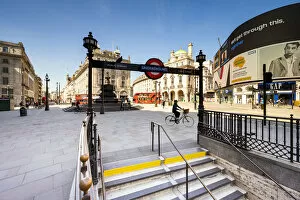 Images Dated 1st June 2020: Cyclist in Piccadilly Circus, London, England, UK