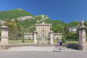 Greenway Del Lago Di Como Prints: A cyclist run on the road near Villa Sola Cabiati