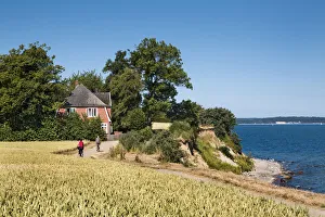 Cyclists at cliff Brodtener Ufer, Niendorf, Baltic coast, Schleswig-Holstein, Germany Cyclists at cliff Brodtener Ufer, Niendorf, Baltic coast, Schleswig-Holstein, Germany