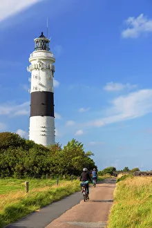 2 People Prints: Cyclists passing Langer Christian lighthouse, Kampen, Sylt, Schleswig Holstein, Germany