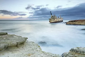 Cyprus, Paphos, Coral Bay, the shipwreck of Edro III at sunset