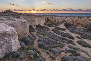 Paphos Prints: Cyprus, Paphos, view of the Tombs of the Kings at the sunset