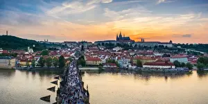 Czech Republic, Prague. Charles Bridge and Pague Castle on the Vltava River at sunset
