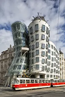 Czech Republic, Prague, A tram crossing in front of the modern building called Tancici