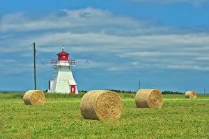 Brae Prints: Darnley Lighthouse and bales Darnley, Prince Edward Island, Canada