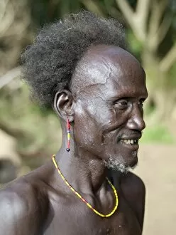 Traditional Attire Gallery: A Dassanech man with a shock of hair