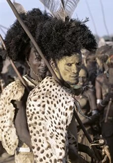 African Ceremony Gallery: A Dassanech man in full tribal regalia participates