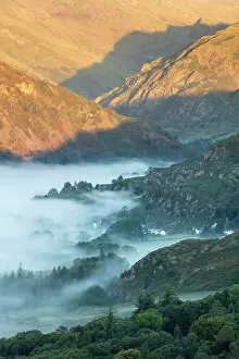 Dawn breaking over Chapel Stile and Langdale, Lake District National Park, Cumbria, England, UK