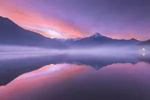 Nature Reserve Prints: Dawn on Legnone mount (Lecco province) reflected into Mera river from Dascio village
