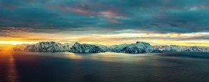 Cloudscape Prints: Dawn over snowcapped mountains, Soroya island, Troms og Finnmark, Norway