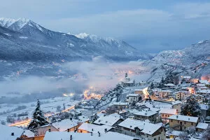 Dawn on the village of Poggiridenti after an snowy night, Province of Sondrio, Valtellina