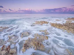 Ironshore Prints: Daybreak on the Caribbean Sea along the rugged ironshore of Grand Cayman in the Cayman Islands