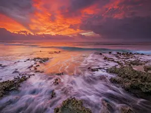 Antilles Prints: Daybreak on the Caribbean Sea along the rugged ironshore of Grand Cayman in the Cayman Islands