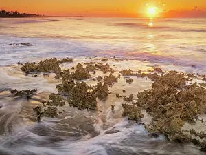 Ironshore Prints: Daybreak on the Caribbean Sea along the rugged ironshore of Grand Cayman in the Cayman Islands