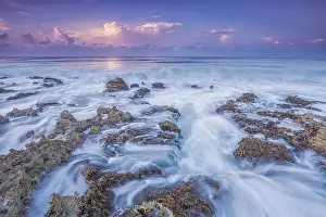 Ironshore Prints: Daybreak on the Caribbean Sea along the rugged ironshore of Grand Cayman in the Cayman Islands