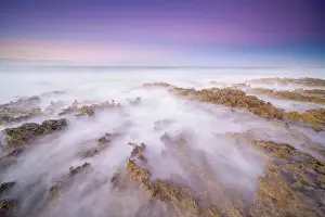 Oceans Seas Prints: Daybreak on the Caribbean Sea along the rugged ironshore of Grand Cayman in the Cayman Islands