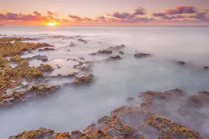Ironshore Prints: Daybreak on the Caribbean Sea along the rugged ironshore of Grand Cayman in the Cayman Islands