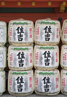 Osaka Prints: Decorative sake barrels at Shinto shrine of Sumiyoshi Taisha, Osaka, Kansai, Japan