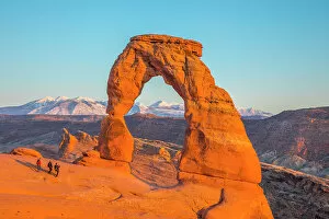 Tourists Gallery: Delicate Arch & La Sal mountains, Arches National Park, Utah, USA