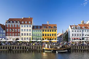 Denmark, Hillerod, Copenhagen. Colourful buildings along the 17th century waterfront