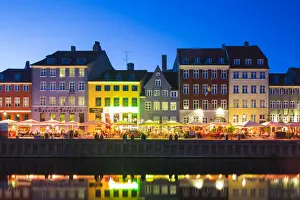Denmark, Hillerod, Copenhagen. Colourful buildings along the 17th century waterfront
