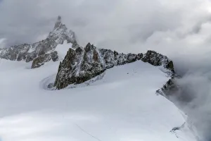 French Alps Gallery: The Dent du Geant (Dente del Gigante in italian) during a windy summer day from the Mont Blanc