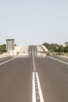 Desert road south of Abu Dhabi, United Arab Emirates