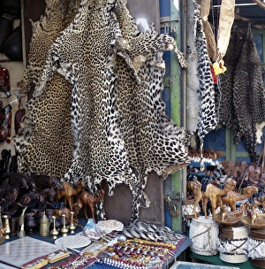 Vendors Prints: Despite a worldwide ban on trade in leopard skins