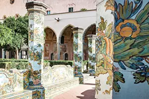 Catholicism Prints: Details of colorful majolica tiles on columns in Santa Chiara convent cloister