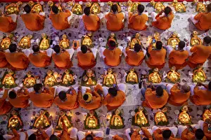 Devotees attend prayer with burning incense and light oil lamps before break fasting