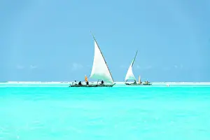 Beauty Prints: Dhow boats sailing in the crystal turquoise water of the Indian Ocean