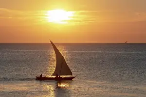 Dhow Prints: Dhow in silhouette at sunset, Nungwi, Zanzibar, Tanzania
