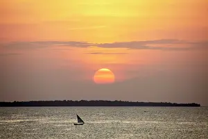 Dhow Prints: Dhow in silhouette at sunset, Nungwi, Zanzibar, Tanzania
