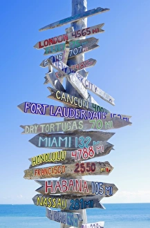 Directions signpost near seaside, Key West, Florida, USA