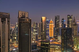 Images Dated 18th July 2016: Doha skyline at dusk, Doha, Qatar