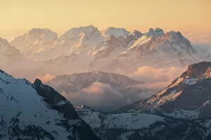 Elevated Collection: The Dolomites mountain range taking the first rays of sun of the day