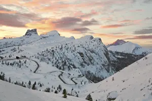 Falzarego Prints: Dolomites, Veneto, Italy. Winter sunrise towards Falzarego with Mount Averau in