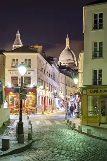 Sacre Coeur Prints: Dome of Sacre-Coeur Basilica over buildings in Montmartre at night