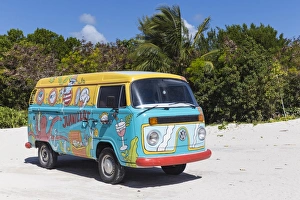 Dominican Republic, Punta Cana, Cap Cana, Colourful Volkswagen van parked on Juanillo