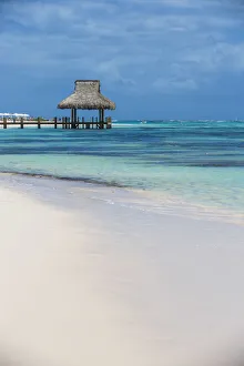 Dominican Republic, Punta Cana, Playa Blanca, Wooden pier with thatched hut