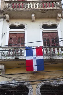 Dominican Republic, Santa Domingo, Colonial zone, Flag on balcony of house on Calle