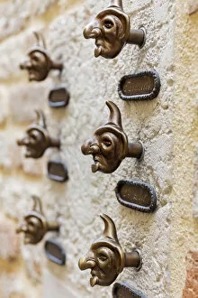 Doorbells shaped like masks, Venice, Veneto, Italy